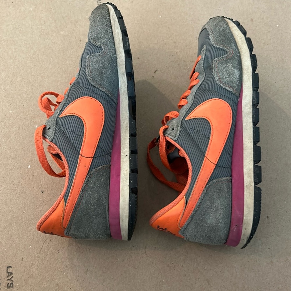 Green and orange Nike Air sneakers